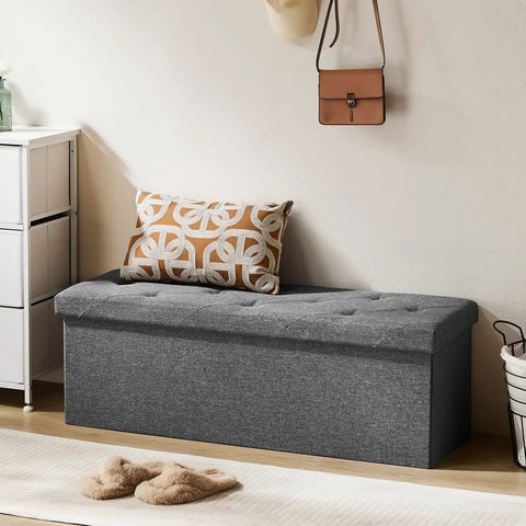 43 Inch Storage Ottoman Bench With Padded Gray Seat And Hidden Chest in living room, showing sturdy MDF frame and multi-purpose use.