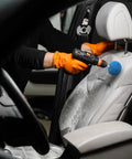 3 Inch Polishing Ball For Drill Detailing Adapter being used on car seat