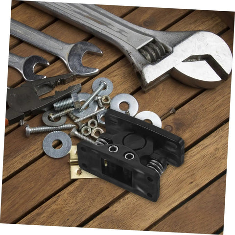 Heavy Duty Plastic Door Catch Latch With Spring Loaded Mechanism For Bedroom Camper And Cabinet Use on a wooden surface with tools.