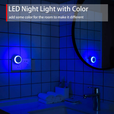 Blue LED Night Light Plug In Dusk To Dawn Sensor Small Round Nightlight in bathroom scene with blue glow on tiled wall