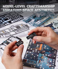 Hands hold model parts for Epic 3D Puzzle Marble Run Model Kit For Adults Do It Yourself Hobbies For Men And Women Cyberpunk Cityscape With 187cm Track Gravity Lift And Marble Transit Labyrinth Adventure