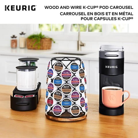 K Cup Carousel Coffee Pod Holder With 360 Degree Rotation Acacia Wood Base And Matte Black Metal Finish Holds 49 K Cup Pods Modern Grab And Go Countertop Organizer For Busy Mornings displayed in a kitchen setting.