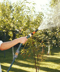 Man using Garden Hose Repair Kit With Zinc And Aluminum Male And Female Fittings Fits 3/4 Inch And 5/8 Inch Hoses Includes Two Sets of Fittings