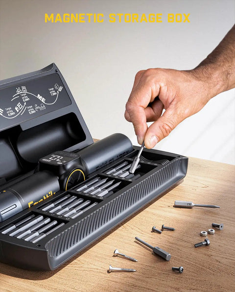 Magnetic storage box with electric screwdriver and bits for laptops, featuring organized slots and screws for precise repairs.
