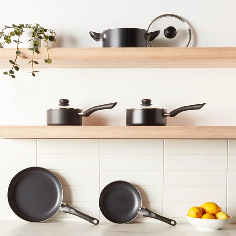 Hassle Free Ceramic Nonstick Eight Piece Pots And Pans Set With Cool Grip Soft Handles For Buttery Smooth Food Slide And Steady Heat Distribution On Any Stovetop In Sleek Black Finish