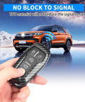 Heavy Duty Smart Key Fob Cover For Ford And Lincoln Rides 2013 Through 2017 With Four Or Five Buttons in hand with car background.