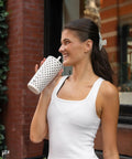 Polka Dot Tumbler Cup 20 Oz French Vanilla Vibes Ceramic Lined interior held by a smiling woman in a white top outdoors.