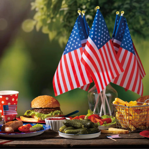 Fourth Of July Flags On Sticks 4x6 Inch Mini American USA Flags for outdoor and indoor decor set on a picnic table with food