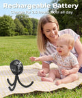 Rechargeable Battery Operated Stroller Fan Clip On for Baby in park with mother on picnic blanket, cooling baby outside.