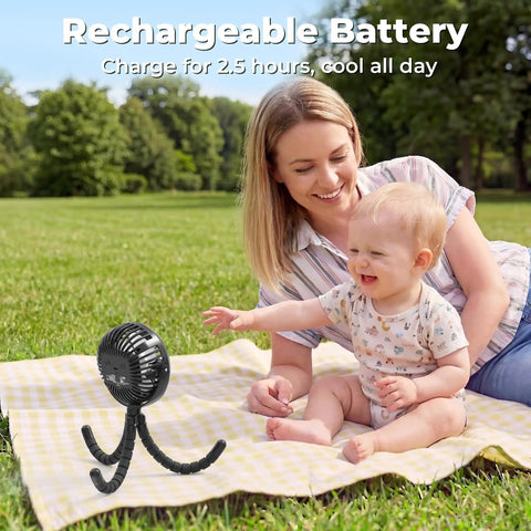 Rechargeable Battery Operated Stroller Fan Clip On for Baby in park with mother on picnic blanket, cooling baby outside.