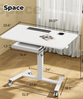 Flex Your Workspace Routine With This Slick Rollaway Standing Desk Featuring A Roomy Desktop Pull Out Storage Bin Built In Mug Holder Heavy Duty Side Hooks And Easy Glide Wheels, white desk showing dimensions.
