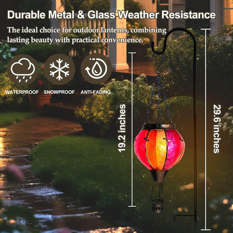 Two Pack Hot Air Balloon Solar Lanterns With Metal Shepherds Hook for Outdoor Pathway Lighting glowing at night