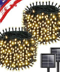 Close-up of 2Pack 500LED Solar String Lights Outdoor Waterproof 180FT with warm white glow and solar panels