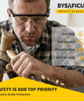 Built Like A Tank 12 Pack Safety Glasses With Anti Fog Coating And UV Protection Scratch Resistant Polycarbonate Lenses All Day Adjustable Fit For Rough Crews Outdoors worn by a man using a hammer.