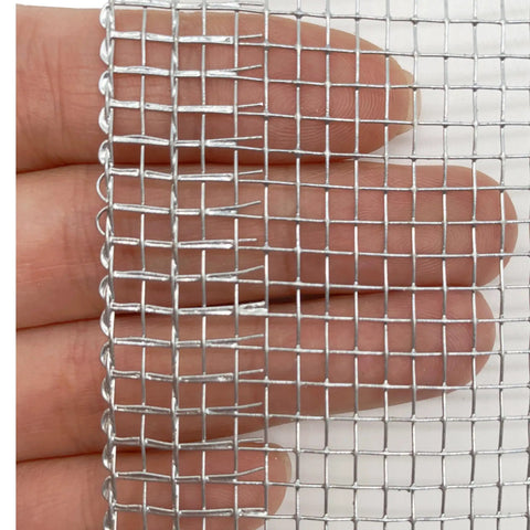 Close-up of One Eighth Inch Galvanized Hardware Cloth Wire Mesh Screen Roll, 16x10, 27 gauge, for beekeeping and garden use.