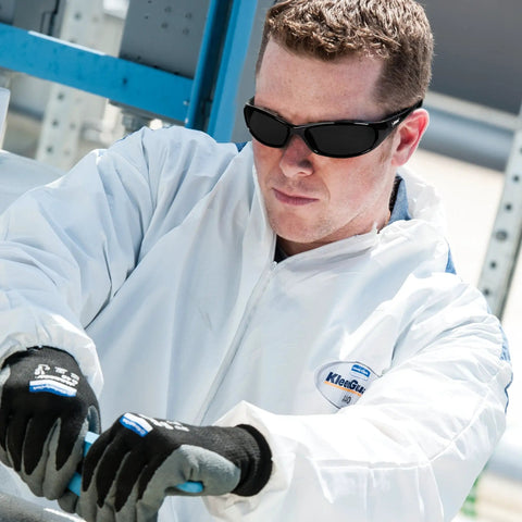 Worker wearing V40 Hellraiser Safety Eyewear With Sunglass Style Frame And Lightweight Flexible Design, ANSI Z87.1 Plus Certified