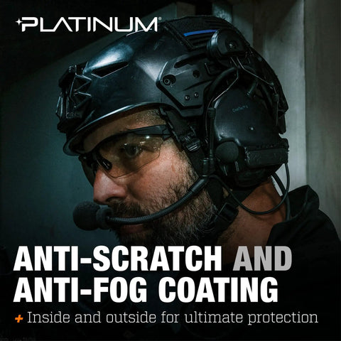 Person wearing Tracker II Tactical Safety Glasses With Smoke Polycarbonate Lens and helmet in dim light