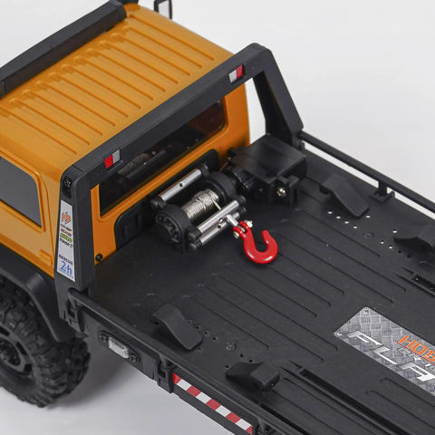 Rear view of Six Wheel 6x6 RC Rock Crawler V1.5 1/18 Scale All Terrain Off Road Ready To Run with open truck bed and tow hook.