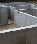 Heavy Duty Five Gallon Concrete Sealer With Water Based Siliconate Formula applied to concrete foundation walls.