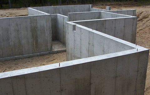 Heavy Duty Five Gallon Concrete Sealer With Water Based Siliconate Formula applied to concrete foundation walls.