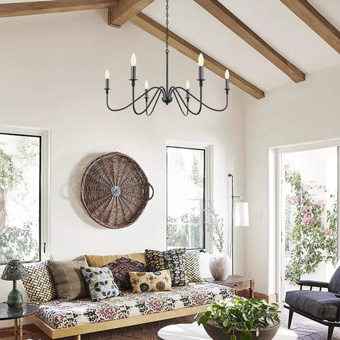 Six Light Farmhouse Chandelier Matte Black Classic Candle Ceiling Fixture in rustic living room setting