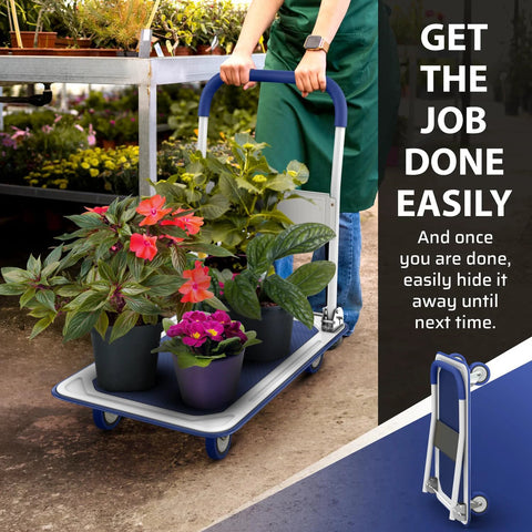 Person using Heavy Duty Foldable Push Cart Dolly with 330 lb capacity for transporting potted plants in a garden setting.