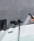 Roman Tub Filler Faucet With Waterfall Spout, wall mounted with single handle and handheld shower, matte black set in use