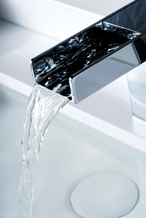 Low Arc Single Hole Waterfall Bathroom Sink Faucet In Polished Chrome Lead-Free Solid Brass Deck Mounted Lavatory Faucet With One Handle European Style Design For One Or Three Hole Installation On Point showing water flow