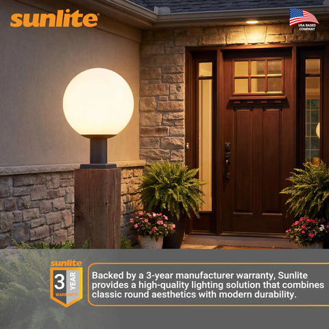 12-Inch Outdoor Post Mount Light Fixture With E26 Socket White Frosted Globe Black Base Weatherproof Wet Rated UL Listed Fits Standard 3-Inch Post Post Not Included Go-To Outdoor Lighting For Porch Patio And Garden Pathways on a porch next to a door.