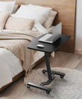 Height Adjustable Laptop Rolling Cart For Ergonomic Workstation Use beside bed, black finish with locking knob and smooth casters