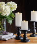 Realistic Flameless LED Candles Set Of 3 With Remote Control Battery Operated Moving Flame Pillars With Timer Melted Top Safe White Glow For Home Decor Hassle Free Cozy Ambience on black stands