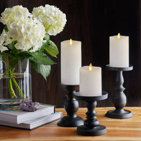 Realistic Flameless LED Candles Set Of 3 With Remote Control Battery Operated Moving Flame Pillars With Timer Melted Top Safe White Glow For Home Decor Hassle Free Cozy Ambience on black stands