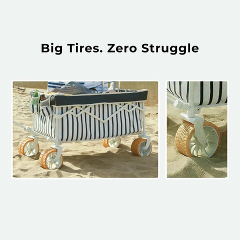 Foldable Beach Wagon With Six Point Seven Inch Fat Tires For Sand And Mixed Terrain No Sweat Easy Pull Cart For Beach And Camping Large Capacity Haul Trunk Ready For Spontaneous Getaways Heritage Navy Stripe features large tires resting on sand.