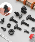 12 Piece Heavy Duty M6 T Slot Drop In Bolts Black Carbon Steel with Hex Flange Nuts on a gray surface.