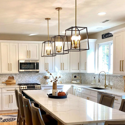 16 Inch 4 Light Modern Black Lantern Pendant Light With Warm Brass Accents Dope Geometric Metal Cage Chandelier in kitchen setting
