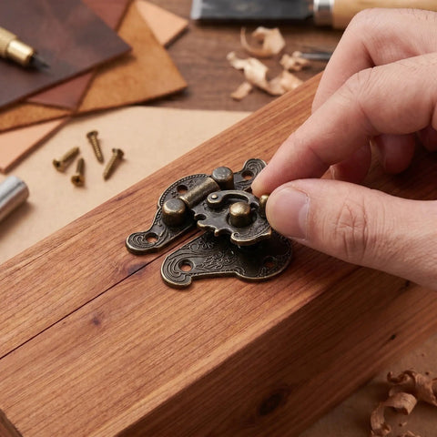 Hand installing 10 Pcs Antique Jewelry Box Latch Clasps Coffee Zinc Alloy with Screws on wooden box for DIY repair