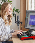 Person using G10 All In One Podcast Studio Bundle with Plug And Play Integrated Mixer And P15 Microphone for live streaming on PC