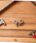 Stainless Steel Eye Bolt M6x20 Closed Ring Anchor For Lifting With Anti Loosening Hardware Beefy Heavy Duty Hook Bolt For Rigging Securing Equipment And Industrial DIY Projects, two M6 eye bolts on wood