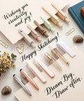 Beige 13 Pack Gel Pens Set With 0.5mm Fine Point Gel Pens And 1.0mm Retractable Ballpoint Pens on decorative paper background.