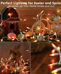 Easter String Lights 33Ft 150 Count Pastel Incandescent Mini Fairy Lights UL Certified draped over decor with eggs and basket.