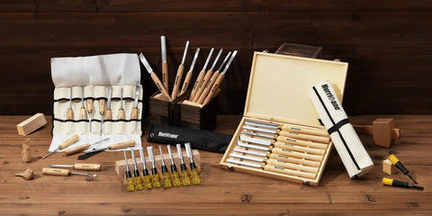 Top Tier 12 Piece Wood Carving Chisel Set With Rock Hard 60CrV Steel Blades And Smooth Ash Wood Grips on wooden table