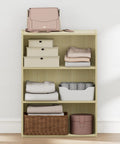 Kick Your Daily Mess To The Curb With This Real Deal Three Tier Closet Organizer In Warm Steam Beech Wood, Built Tough For Tight Bedrooms And Zero Headache Setup, Featuring Smooth Open Shelves For Dependable Home Organization, showcasing neatly folded clothes, storage boxes, and a handbag.