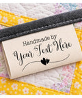 Next Level Custom Cotton Tags Straight Up Premium Fabric Sewing Labels For Quilting Knitting Handmade Clothing Branding Markers Machine Washable Care Instructions 40X50Mm on a quilted fabric background.