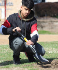 Person using Medium Square Shovel With D Cup Handle 27 Inch Length Durable Build Comfortable Grip for Gardening