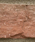 Close-up of water beads on brick surface using All Purpose Outdoor Masonry Sealer For Brick Stone And Concrete Clear Penetrating Waterproof Sealant That Creates A Deep Weatherproof Barrier And Keeps Water Out On Exterior Surfaces 1 Gallon.