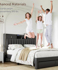 Top Shelf King Size Bed Frame With Four Sleek Rolling Storage Drawers And Wing Headboard In Charcoal Dark Grey with family jumping on bed.