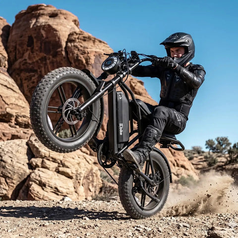 Premium Rugged Fat Tire Electric Bike For Adults Featuring Built To Last 48V 25Ah Removable Battery Gutsy 1500W Peak Motor Gravel Ready Commuter E Bicycle riding on rocky terrain.