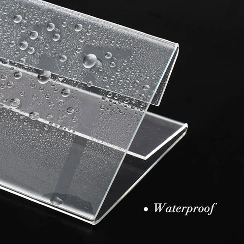Close-up of waterproof clear acrylic design from Set Of 30 Mini Acrylic Sign Holders, 2 X 3.5 Inch Clear Desk Name Plates.