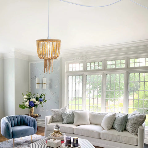 16 Inch Modern Drum Pendant Light With Fabric Shade Rustic Hanging Drum Chandelier Boho Style Plug In Fixture Handmade Wood Bead Accents Creates Cozy Ambient Vibe Shadows For Dining Room Living Room Kitchen And Bedroom in elegant living room setting