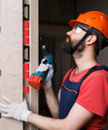 Professional Grade 200 Count Quarter Inch Thick Red Plastic Shims For No Sweat Tile Leveling And Reliable Door Window Gap Filling Designed To Keep Your Home Projects Looking Clean And Dead Nuts Straight Daily used by a man with a drill.